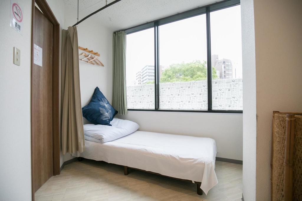123 Guesthouse Osaka Habitación foto