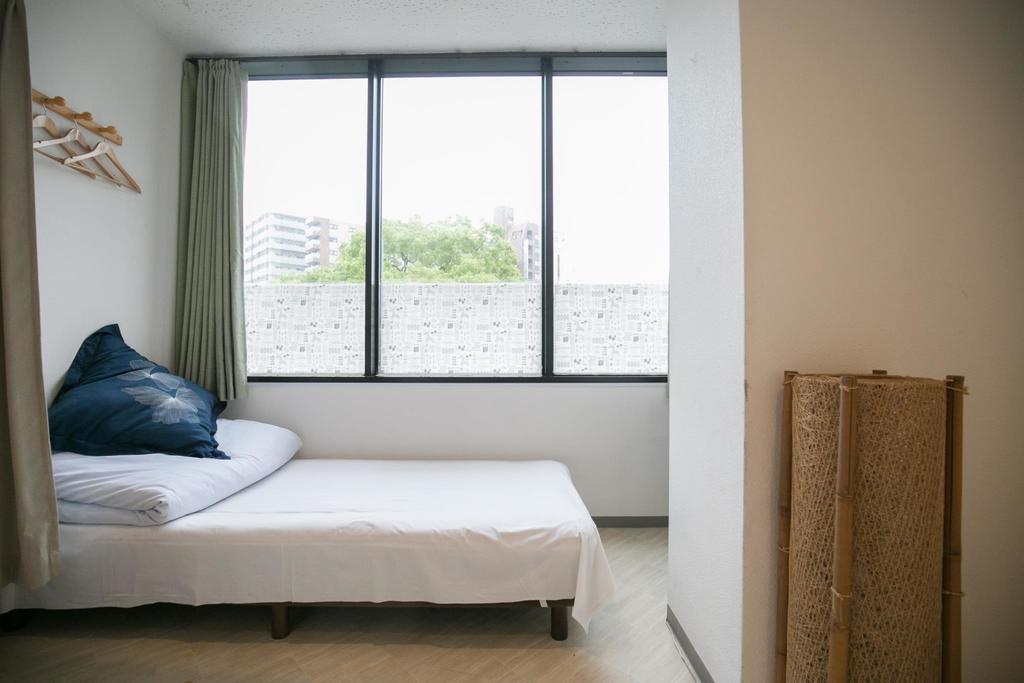 123 Guesthouse Osaka Habitación foto